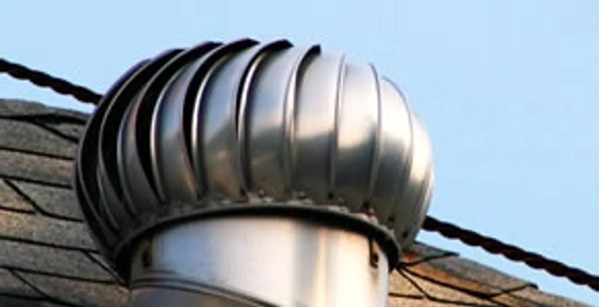attic fan installation services with professionally installed roof ventilation unit in Madison, WI