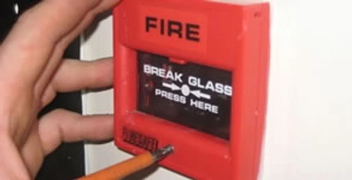 fire alarm installation service showing manual fire alarm pull station installed by licensed electricians in Madison, WI