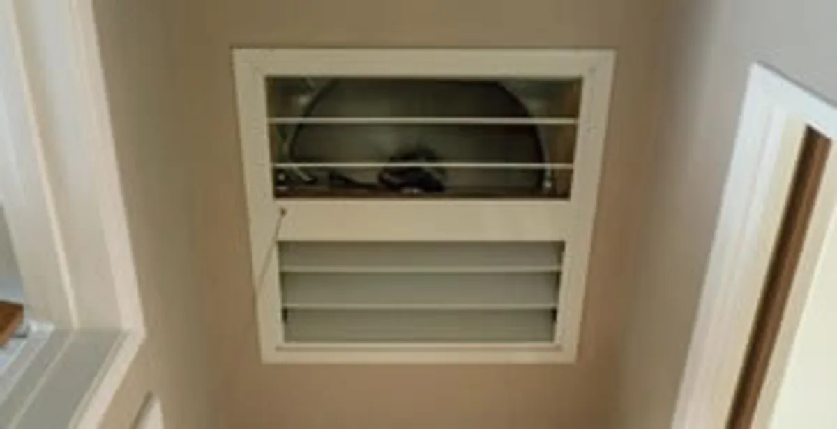 whole house fan installation services with ceiling-mounted ventilation system in Madison, WI